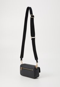 Tommy Hilfiger DISTINCT CAMERA BAG - Cross body bag - black