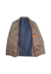 Bruine tweed blazer met een gladde marineblauwe voering. Voorzien van twee binnenzakken en een label. Opvallende textuur van de buitenstofweving.