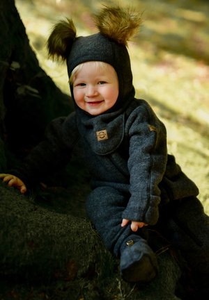 Gray fleece outfit with a hood featuring fuzzy brown accents. The design includes a front zipper and a logo patch on the chest.