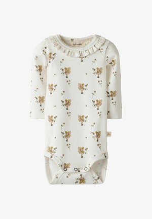 Kremkrāsas garuma piedurkņu bērnu bodijs, rotāts ar zelta un brūnu ziedu rakstiem un feju ilustrācijām, ar ruļļveida apkakli un spiedpogu aizdari.