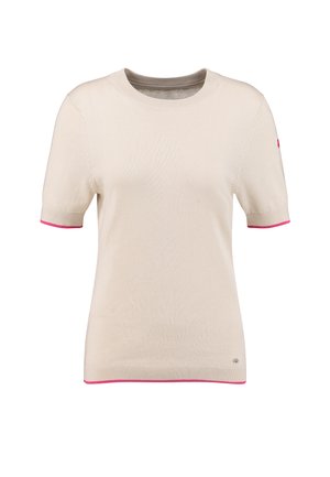 Kremowy krótki sweter z dzianiny z różowym obszyciem na mankietach i na dole, z małym metalicznym logo przy dolnym brzegu.