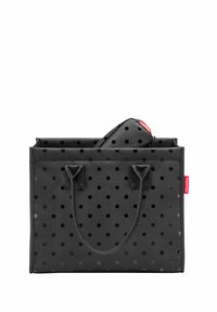 Sac fourre-tout noir avec un grand motif à pois, fabriqué dans un matériau durable, doté de deux poignées et d'une pochette assortie plus petite à l'intérieur.