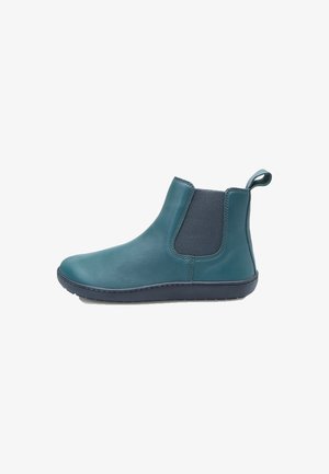 Teal leather ankle boot with elastic side panels, round toe, and pull tab; features a textured rubber sole for grip and flexibility.
