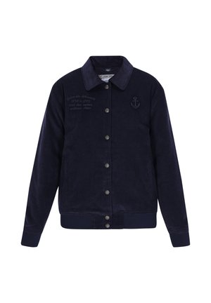 Mørkeblå kordfløjl jakke med knaplukning, krave, anker emblemet på brystet og subtilt broderet tekst på venstre side.
