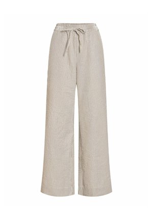 Pantalon large à rayures verticales beige et blanches avec taille élastique et cordon de serrage devant.