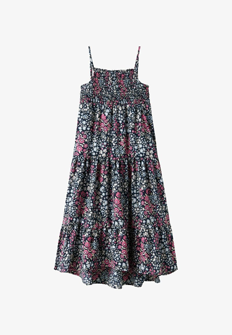 Cvjetna haljina s halter naramenicama, tamnoplava osnova i višeslojnim ruffles. Sadrži uzorak ružičastih i bijelih cvjetova na tamnoj pozadini.