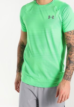 Green, short-sleeve athletic shirt with a textured mesh design; features a small black logo on the chest and flat seams for comfort.