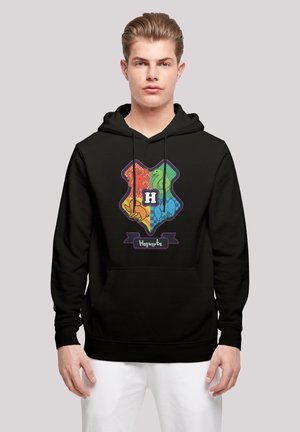 Fekete kapucnis pulóver színes Hogwarts címer grafikával, állatok ikonjával és "Hogwarts" felirattal egy szalag alatt. Állítható zsinórok találhatók rajta.