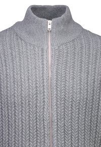 Gray knitted sweater with a high collar, featuring a visible front zipper and a textured pattern of raised chevrons.