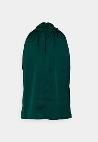 Cape en satin vert foncé avec col froncé et fermeture par boutons au niveau du cou, présentée à plat sur un fond clair.
