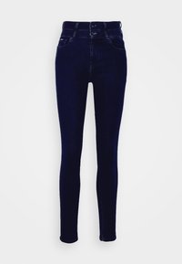 Jeans ajustados en denim azul oscuro con una textura suave. Presentan una cintura alta, dos bolsillos frontales y cierre de botón en la parte delantera.
