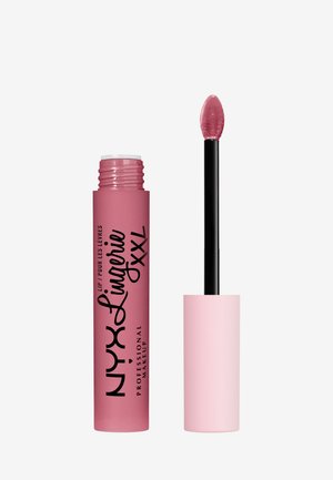 Rouge à lèvres liquide dans un tube rose doux, avec du texte noir. Comprend un applicateur en forme d'oie pour une application lisse.
