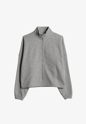 Szara krótka bluza rozpinana na zamek z wysokim kołnierzem, opuszczonymi ramionami i elastycznymi mankietami; wykonana z miękkiego, rozciągliwego materiału.