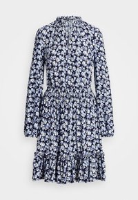 Marinblå blommig klänning med långa ärmar, samlad midja och volangkant. Materialet har en mjuk, lätt vikt med ett fint blommönster.