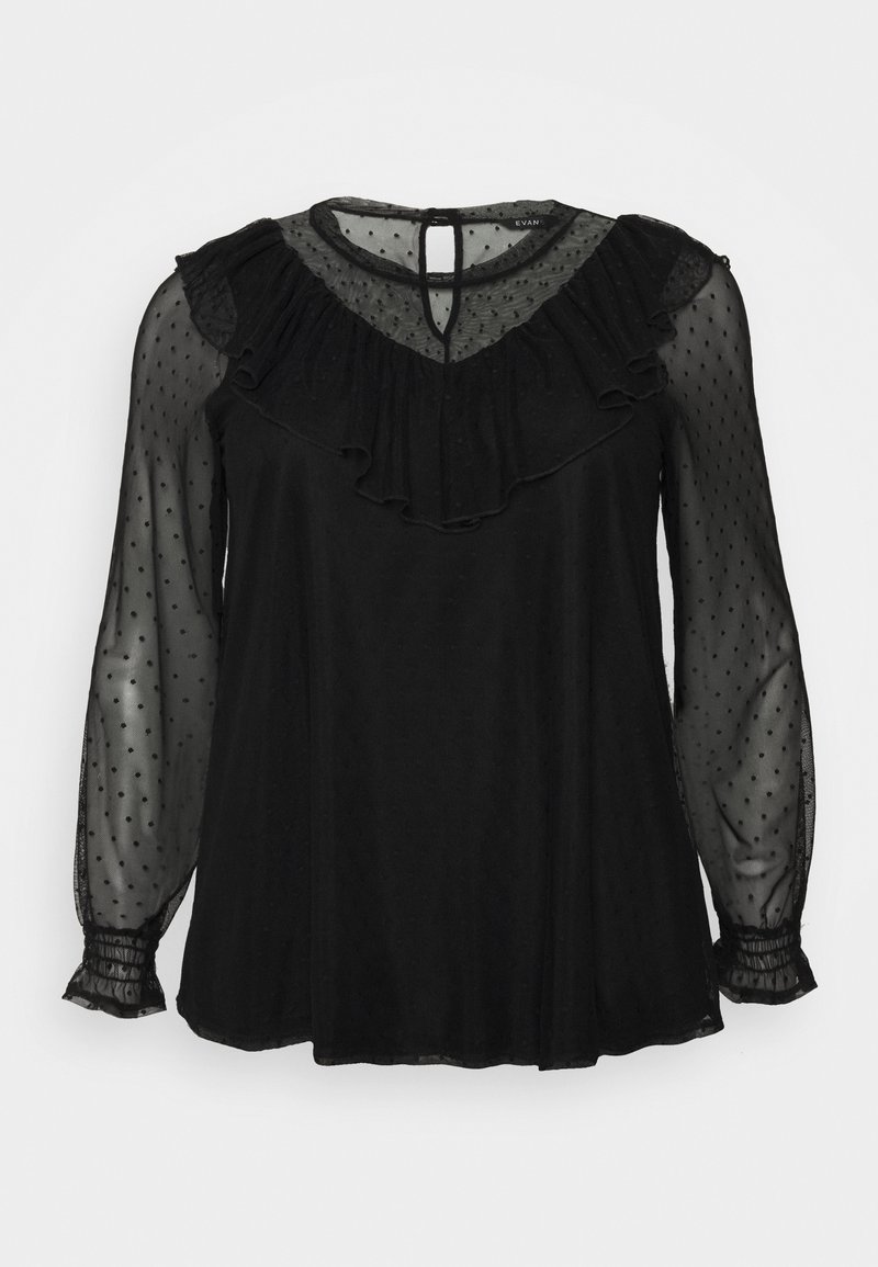 Blusa nera con maniche trasparenti a pois e scollo con volant. Presenta chiusura con bottoni sul retro e polsini elasticizzati. Tessuto morbido e fluido.