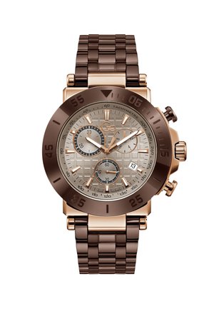 Pruun metallist kronograafi käekell tekstuurse beeži sihverplaadiga, kolme alatihviga, kuupäeva aknaga ja pruuni link-rihmaga. Omab roosakuldseid aktsente.