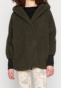 Noisy May Kort kappa / rock - dark green