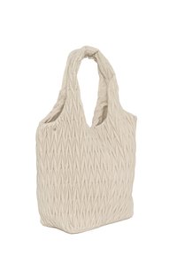 Sac fourre-tout en tissu matelassé beige avec un motif texturé en losanges et des poignées larges et rembourrées.