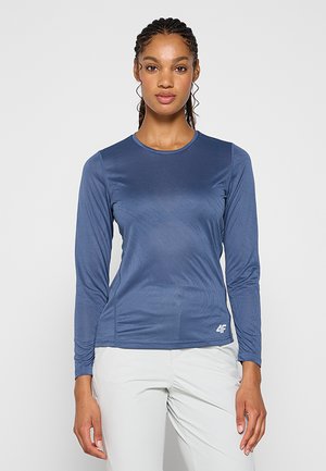 Koszulka sportowa z długim rękawem w ciemnoniebieskim kolorze, o gładkiej fakturze, okrągłym dekolcie i małym białym logo na dolnej prawej stronie.