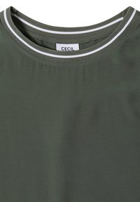 Dark green crew neck shirt with white double stripes on the ribbed collar and a "CECIL" brand label inside the neckline.