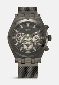 Reloj cronógrafo para hombre de acero inoxidable negro con una correa de malla texturizada, cara redonda, tres subesferas y acentos plateados en la esfera.