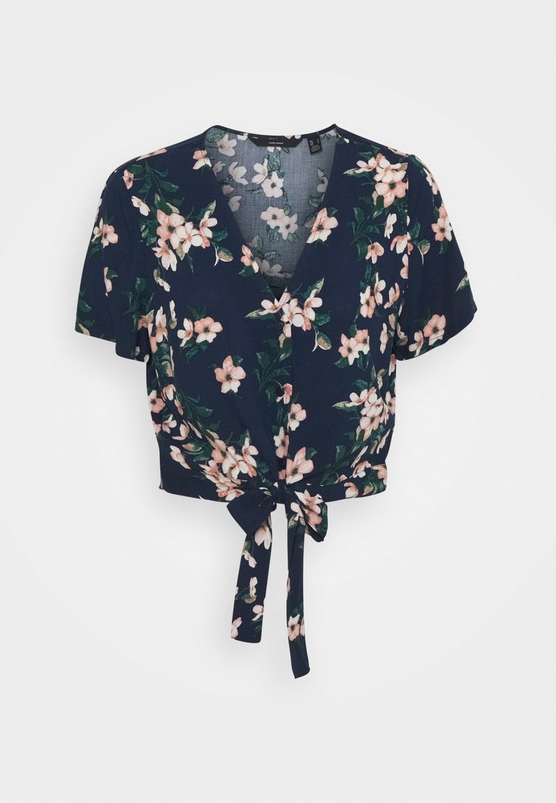 Blouse bleu marine à manches courtes avec imprimé floral rose clair, nœud à l'avant, encolure en V et coupe ample.