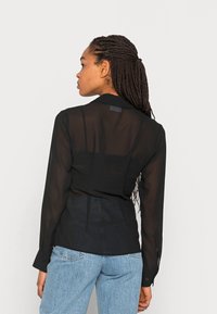Weekday LUCID - Blusa - black