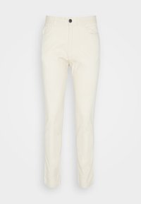 Pánské kalhoty ve slim-fit střihu v krémové barvě s předními kapsami, poutky na opasek a černým zapínáním na knoflík.