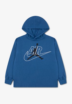 Sweat à capuche bleu avec logo Nike Air et silhouette noire d'un joueur de basketball sautant sur la poitrine. Aucune personne visible.