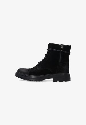 Schwarze Wildleder-Schnürstiefel mit seitlichem Reißverschluss, runder Zehenpartie, dicke Gummisohle und knöchelhohem Design.