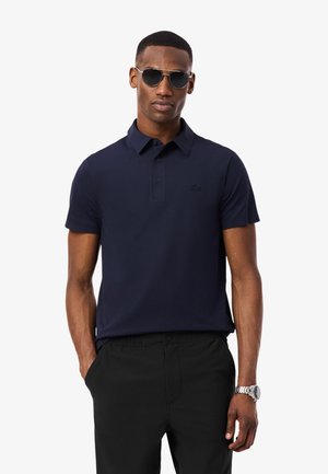 Poloshirt - bleu marine-hde