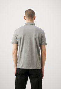 Armani Exchange Polo marškinėliai - light grey