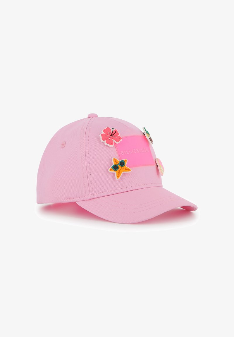 Casquette de baseball rose en coton avec une visière incurvée. Elle est ornée d'épinglettes décoratives : une fleur, une étoile de mer et d'autres accents colorés.