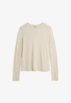 Bež sako dugih rukava izrađeno od mekanog materijala, s okruglim izrezom i detaljima na ramenima te opuštenim krojem, glatke teksture bez vidljivih uzoraka.