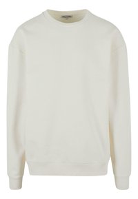 Felpa leggera colore beige chiaro, realizzata in morbido misto cotone. Presenta polsini e orlo a coste, con spalle scese per una vestibilità rilassata.