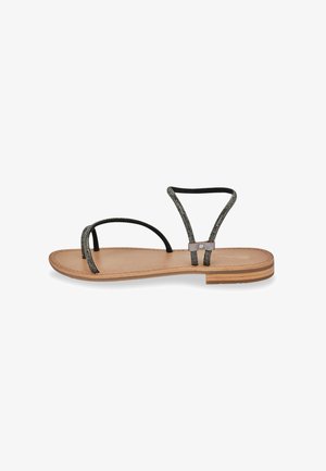 Zwarte sandalen met bandjes, voorzien van een dunne enkelband en een platte leren zool. Heeft metalen draadaccenten en minimalistische designelementen.