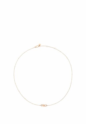 Zarte dünne goldene Halskette mit kleinem runden Verschluss und gleichmäßig verteilten winzigen Perlen vor weißem Hintergrund.