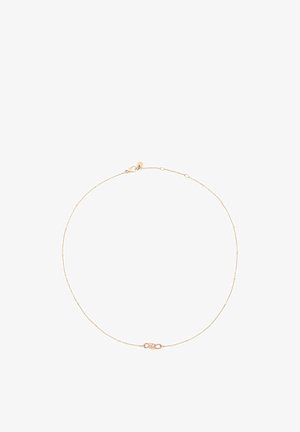 Zarte dünne goldene Halskette mit kleinem runden Verschluss und gleichmäßig verteilten winzigen Perlen vor weißem Hintergrund.