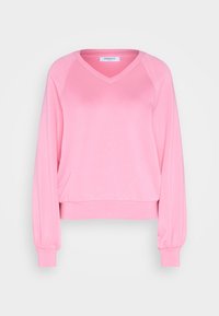 Różowa bluza pulower z dekoltem w serek, długimi rękawami raglanowymi, ściągaczami przy mankietach i luźnym krojem. Wykonana z miękkiego, gładkiego materiału.