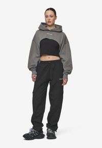 Pegador YURI TRACKSUIT PANTS - Tracksuit bottoms - black