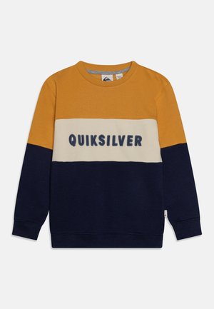 Felpa in cotone con collo rotondo, caratterizzata da strisce senape, crema e blu navy, e con la scritta "QUIKSILVER" ricamata in blu navy sul petto.