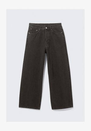 Wide-leg black denim jeans feature a high waist, five-pocket design, and a button-fly closure. The fabric has a soft, textured finish.