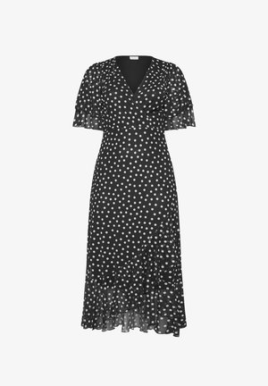 Robe midi noire à pois blancs, col en V, manches volantées et ourlet asymétrique à volants.