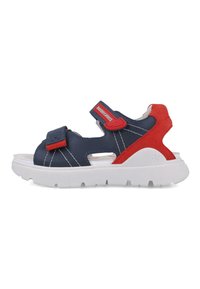 Sandalias sintéticas de color azul marino y rojo con correas de velcro, suela de goma blanca y detalles cortados en los laterales para ventilación.