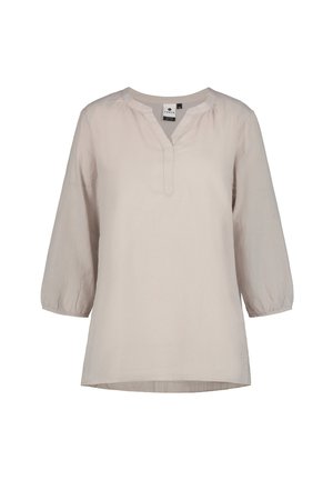 Beżowa bluzka z długim rękawem o długości 3/4, z okrągłym dekoltem i ozdobnym rozcięciem z przodu, wykonana z lekkiego materiału.