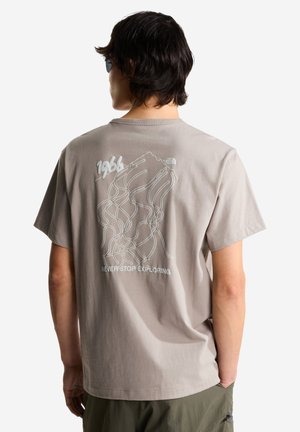 The North Face, U NSE SLOPES RLX SS TEE-GRAPHIC. UNISEX - T-shirt imprimé - stone slab