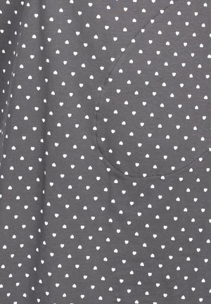 Gray fabric with white heart-shaped patterns; features a rounded pocket on the left side. Smooth texture, lightweight material, casual design.