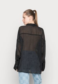 Monki Blusa com botões - black