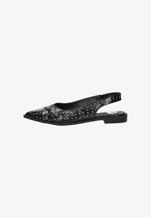 Black pointed slingback flat shoe with silver studs and eyelet details, featuring a low heel and textured finish.
