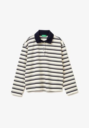 Chemise à manches longues crème avec des rayures horizontales noires, un col noir, et trois boutons sur le devant, posée à plat sur un fond blanc.